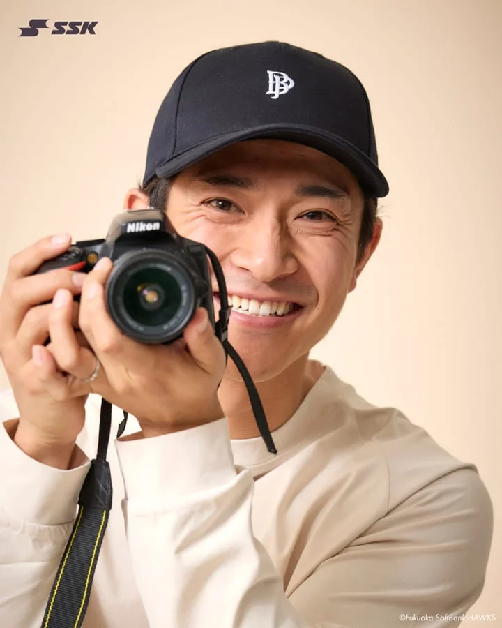 カメラを持つ男性