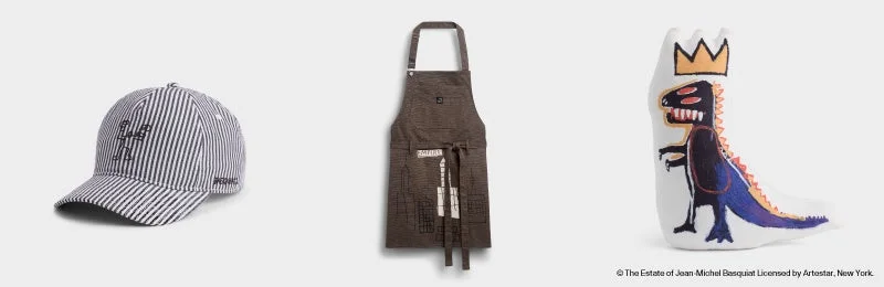 バスキアのアートが施されたキャップやエプロン、クッション