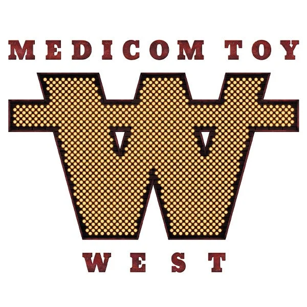 「MEDICOM TOY WEST」のロゴマークです。電飾で飾られた大きな「W」の文字が中央にあり、上下にブランド名と地域名が配置されています。
