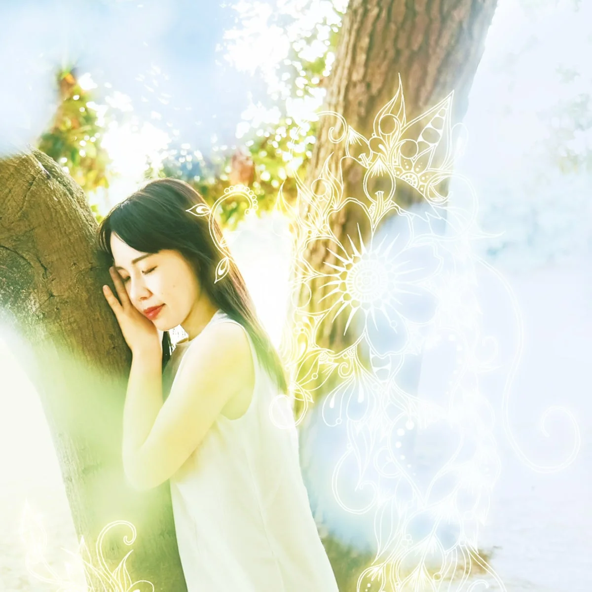 木に寄りかかる女性