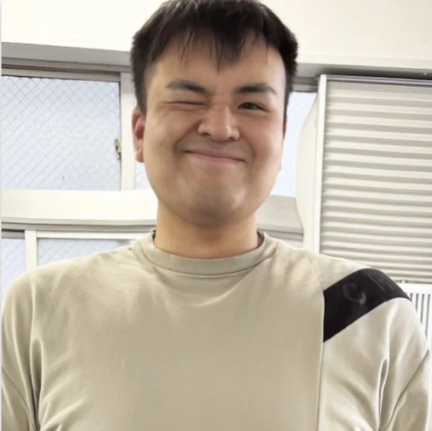 吉田店長の顔写真