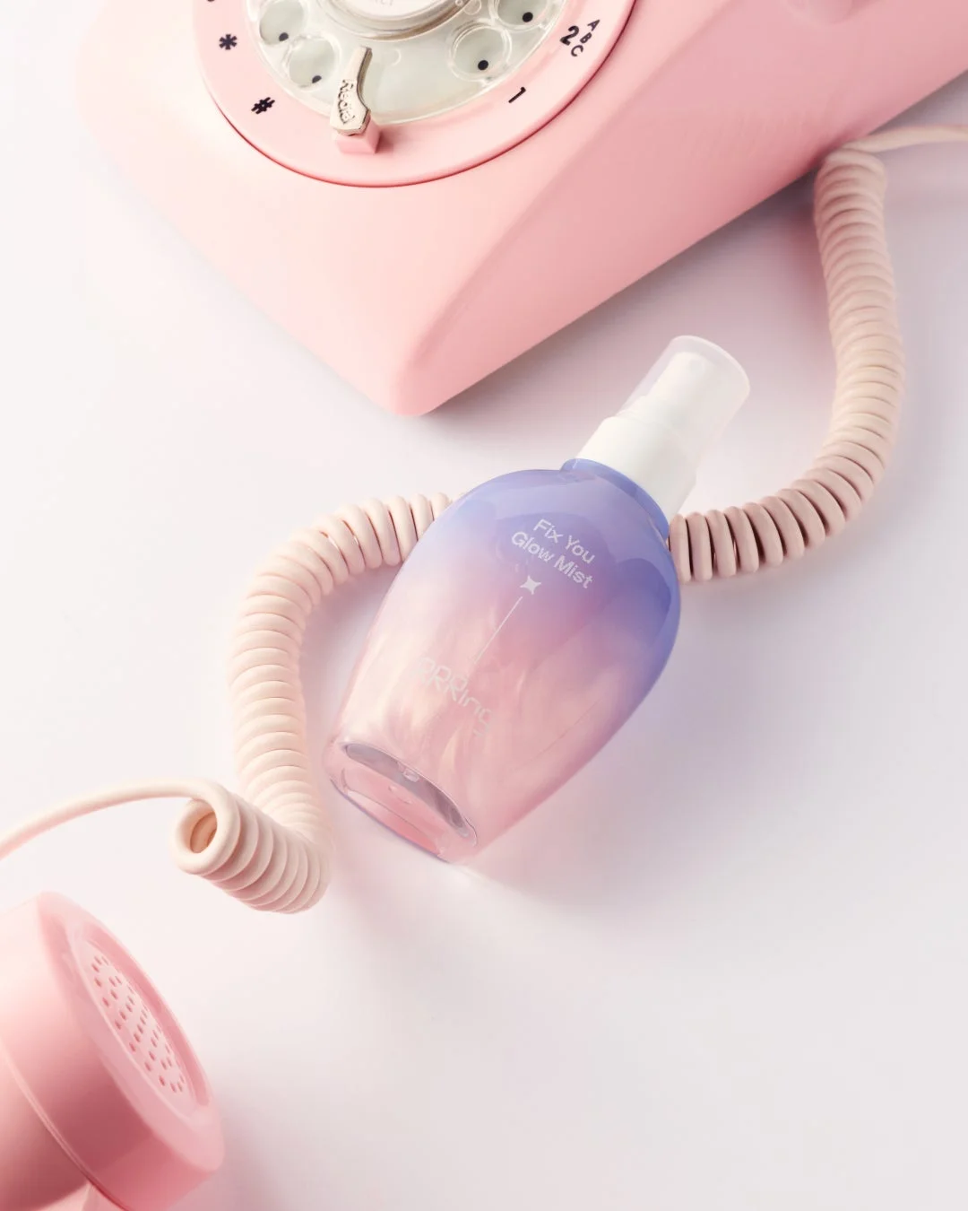 リリリング フィックスユー グロウミストの製品とレトロな電話