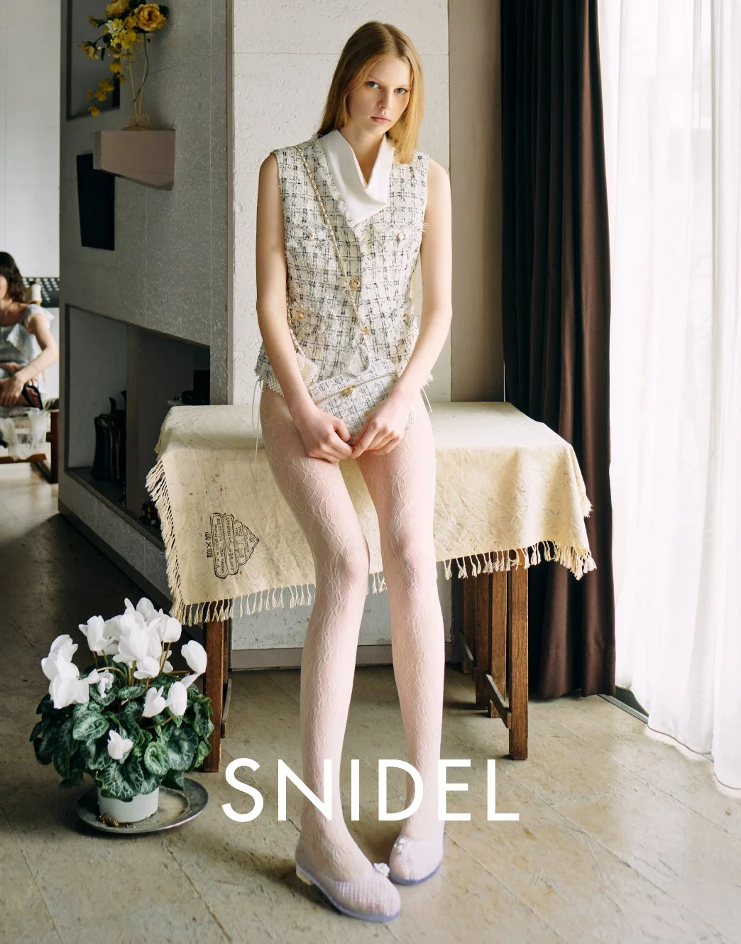 SNIDELロゴとイメージ