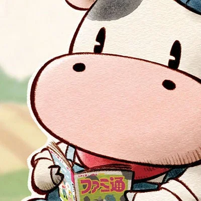 牛のキャラクターがファミ通を読むお祝いビジュアル