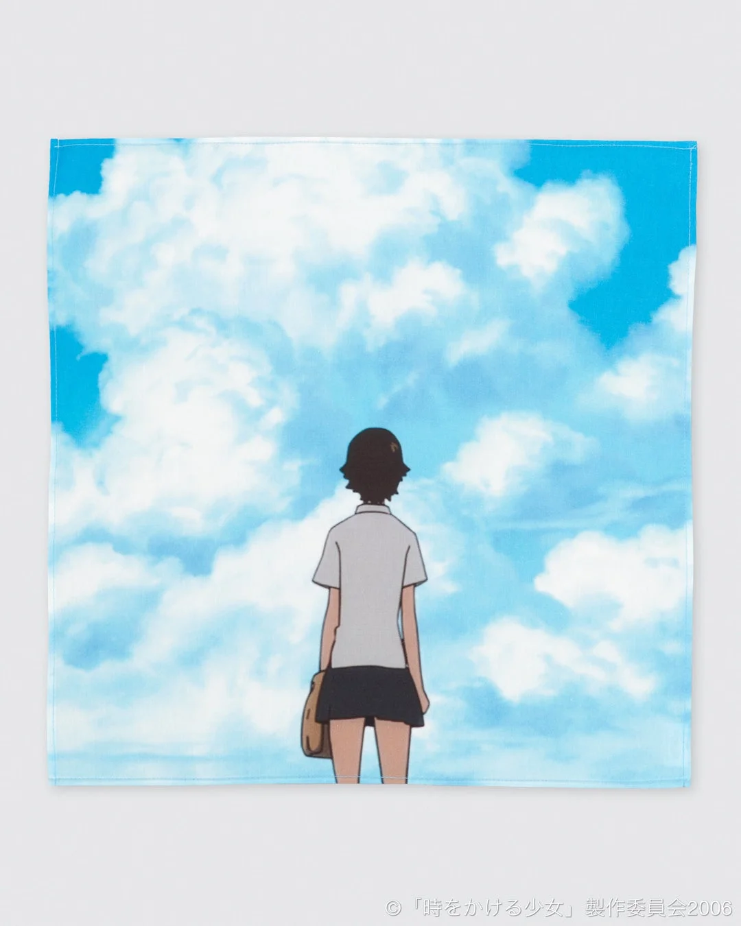 夏の入道雲を見上げる真琴の後ろ姿のイラスト