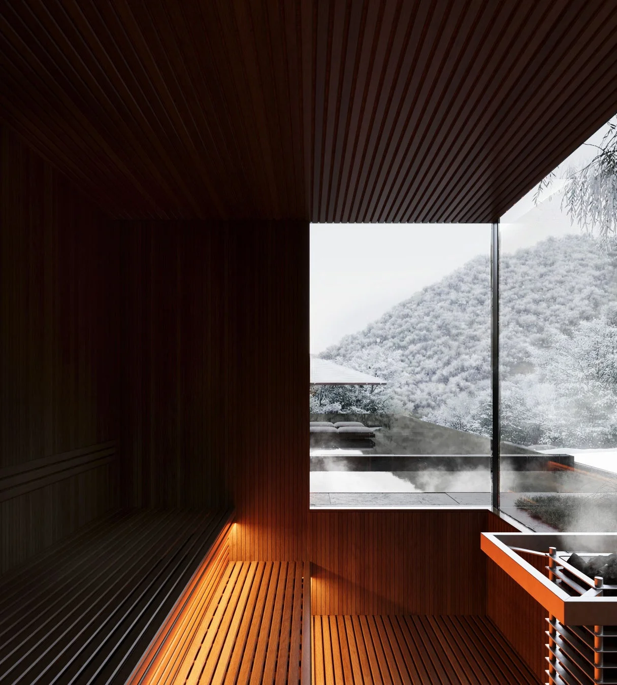 木製の内装が特徴のサウナから雪化粧した山々を望む