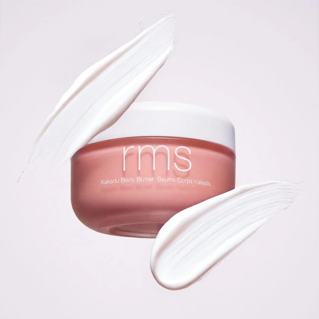 ピンク色の容器に入ったrms Kakadu Body Butter