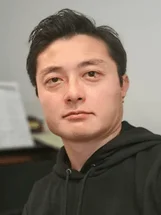 井尻 善久 氏